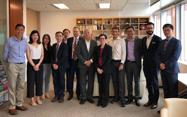 CIBELers at HKU with Acting Dean Professor Hualing Fu (R6), Dr Giuliano Castellano (R2), Mr Syren Johnstone (R4), Dr Michael Ng (L1), Professor Xian Chu Zhang (L5), Dr Evan Gibson (L6), Dr Han Zhu (L3).